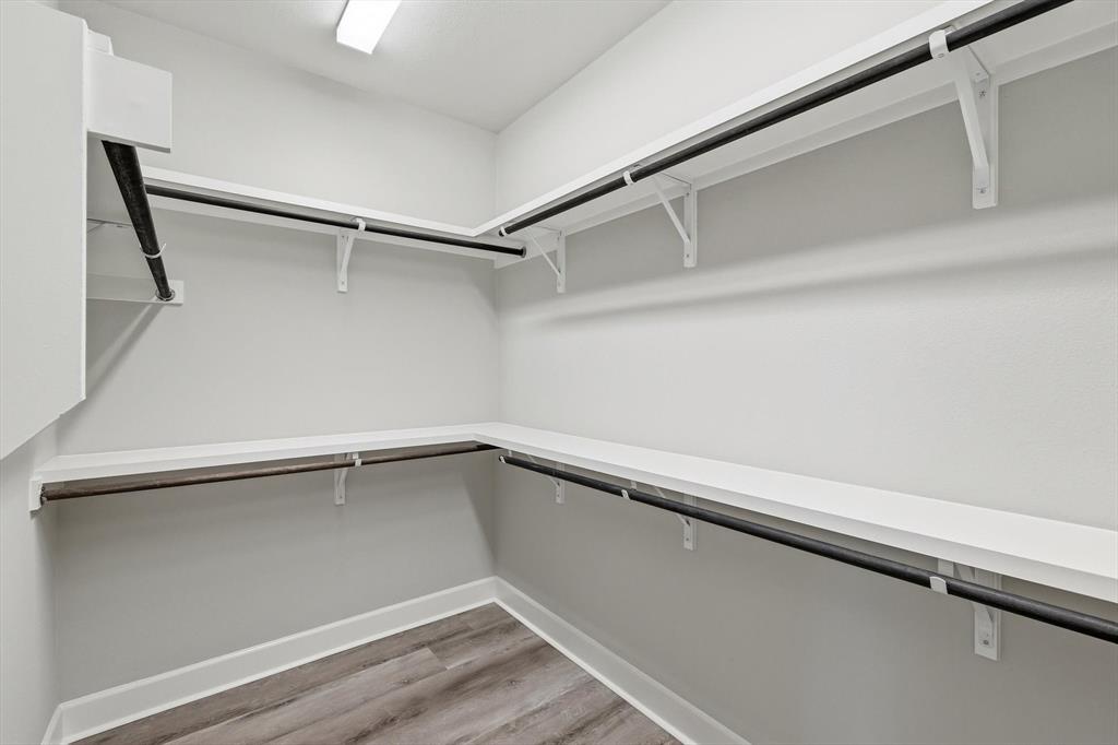 7129 Laurel Ridge Dallas, TX 75231 - Photo 21 of 35 Large walk-in closet off primary bathroom.