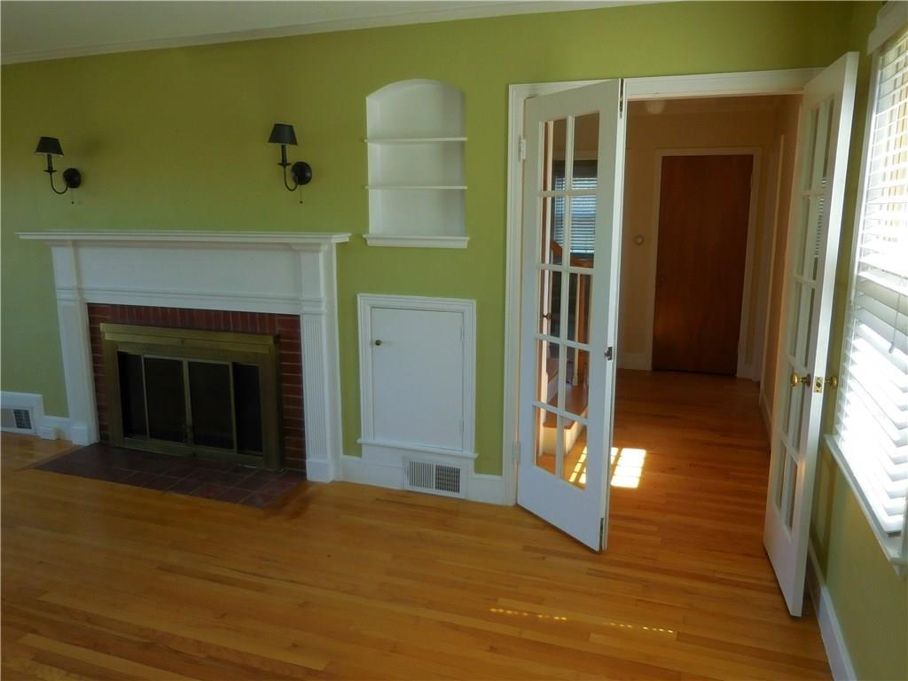 54 Hillview Road Gorham, ME 04038 - Photo 13 of 35 Wood storage beside fireplace.