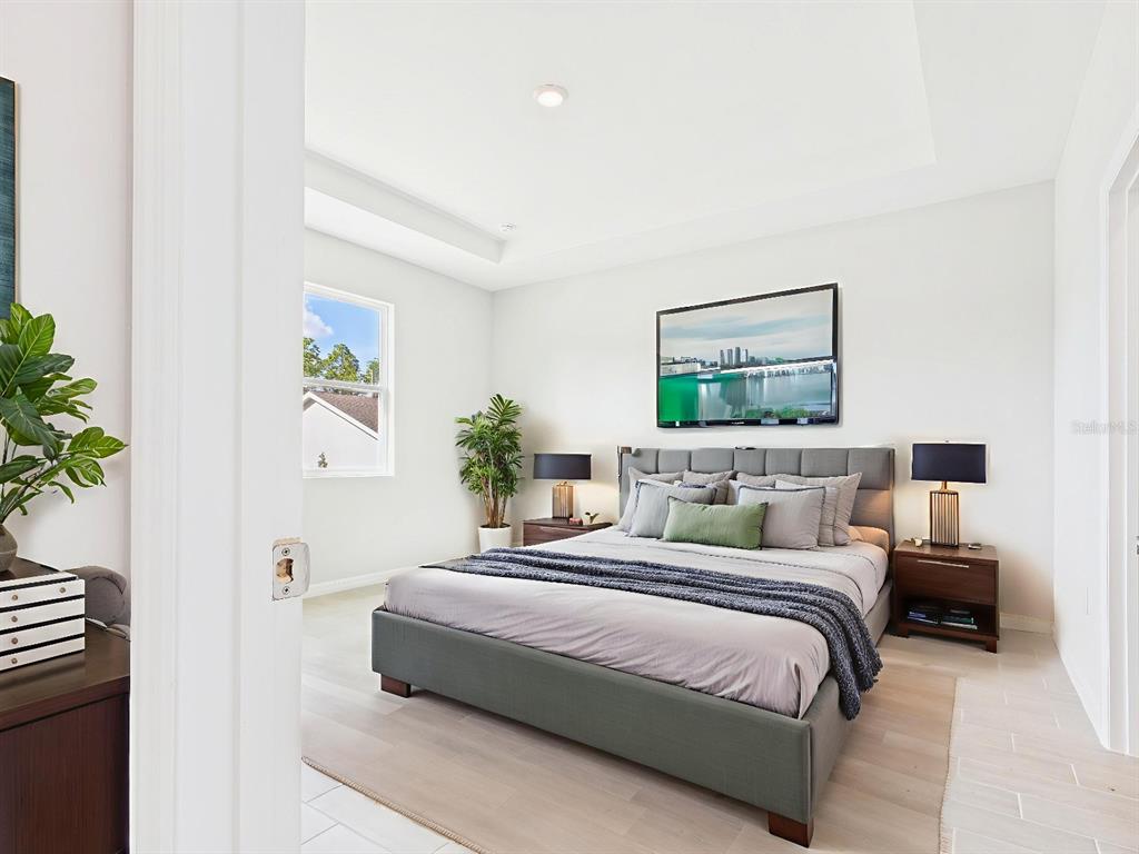 8419 North Inca Way Dunnellon, FL 34434 - Photo 11 of 15 a bedroom with a bed and a painting on the wall