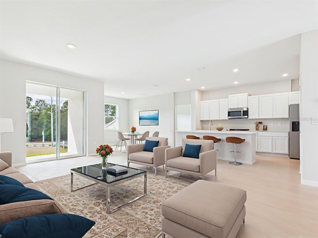 8419 North Inca Way Dunnellon, FL 34434 - Photo 2 of 15 a living room with furniture and kitchen view