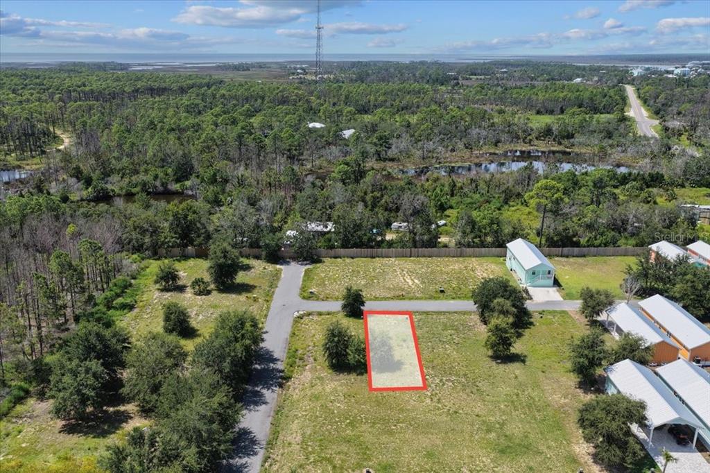 0 Southwest 869th Loop Steinhatchee, FL 32359 - Photo 4 of 14 an aerial view of a house with a yard