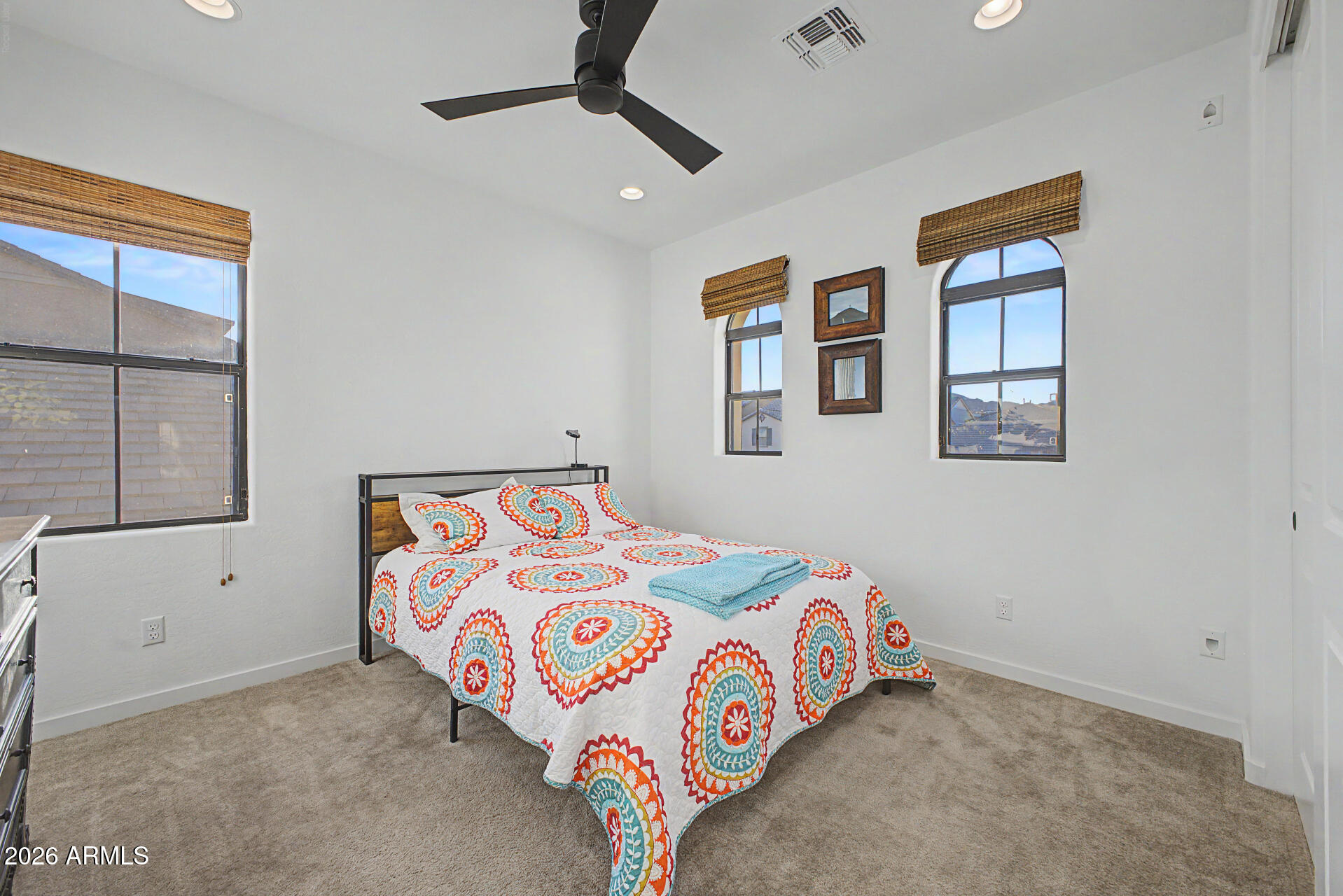 819 West Deer Creek Road Phoenix, AZ 85048 - Photo 48 of 76 a bedroom with a bed and a window