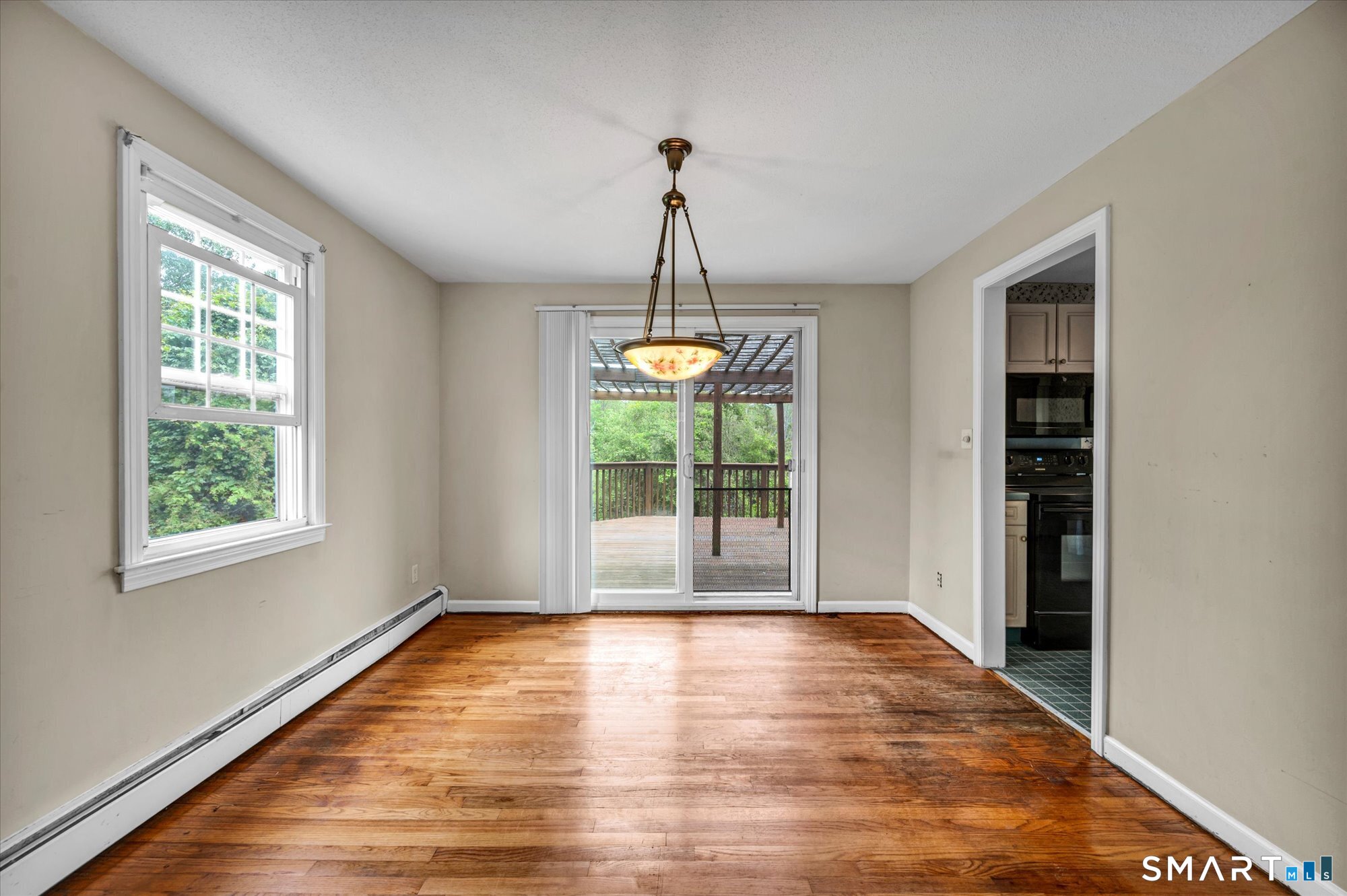 64 South Branford Road Wallingford, CT 06492 - Photo 6 of 31 Dining room with sliders to the deck.