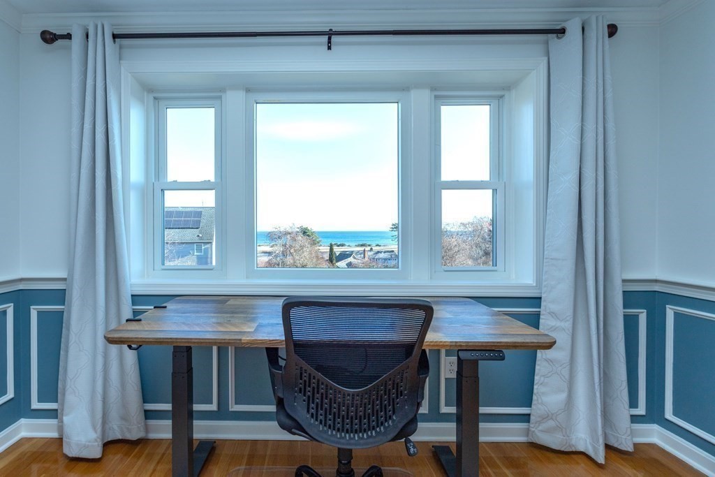 1 Lily Pond Road Plymouth, MA 02360 - Photo 18 of 40 a table and chair sitting in a room
