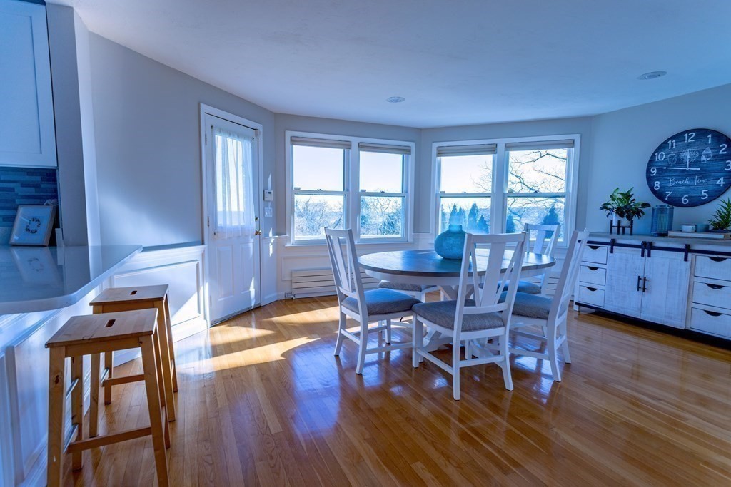 1 Lily Pond Road Plymouth, MA 02360 - Photo 19 of 40 a view of a dining room with furniture window and wooden floor
