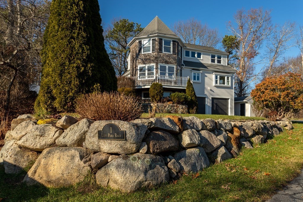 1 Lily Pond Road Plymouth, MA 02360 - Photo 2 of 40 a front view of a residential apartment building with a yard