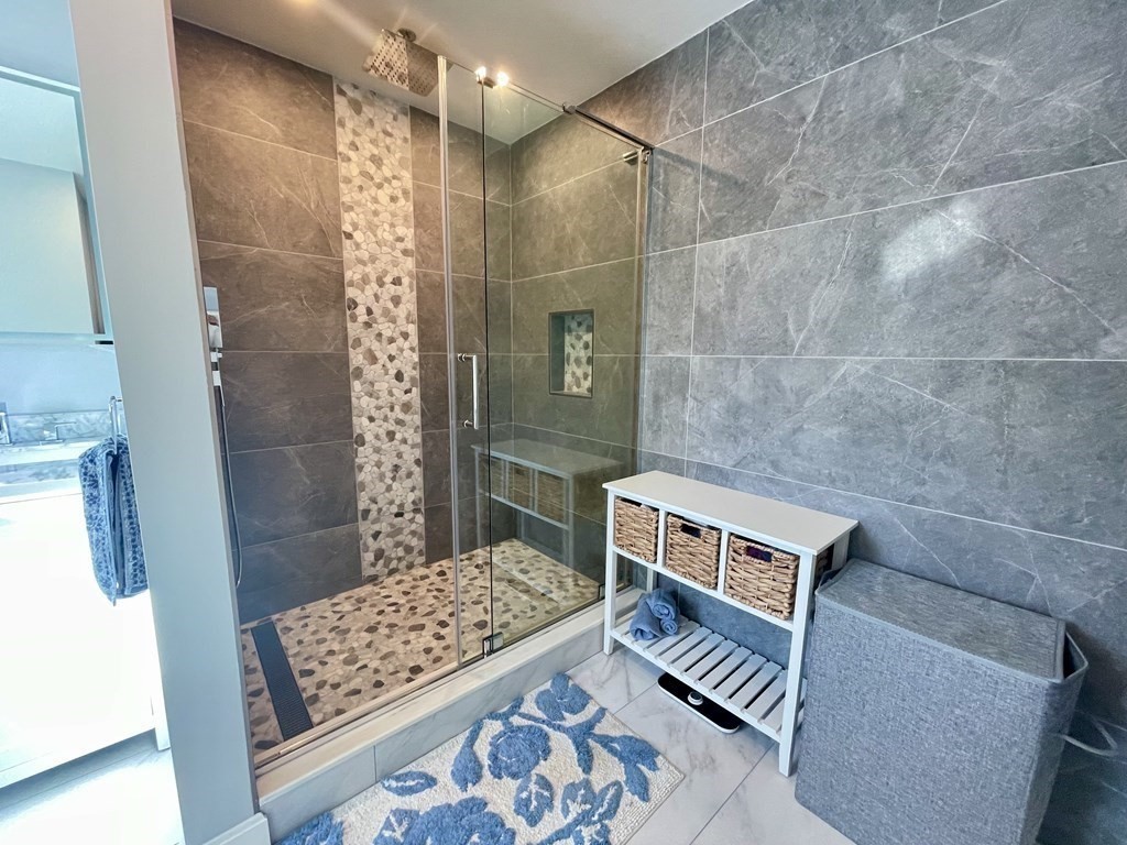 1 Lily Pond Road Plymouth, MA 02360 - Photo 30 of 40 a bathroom with a sink a toilet a shower and a mirror