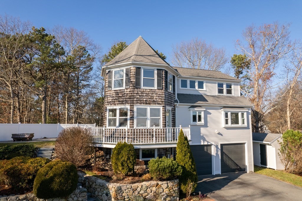 1 Lily Pond Road Plymouth, MA 02360 - Photo 3 of 40 a front view of a house with a yard