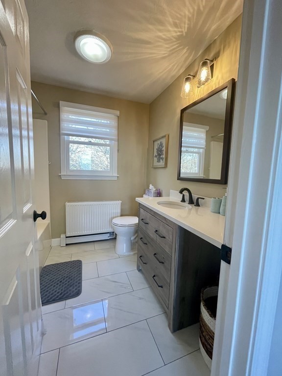 1 Lily Pond Road Plymouth, MA 02360 - Photo 33 of 40 a spacious bathroom with a double vanity sink a mirror and a bathtub