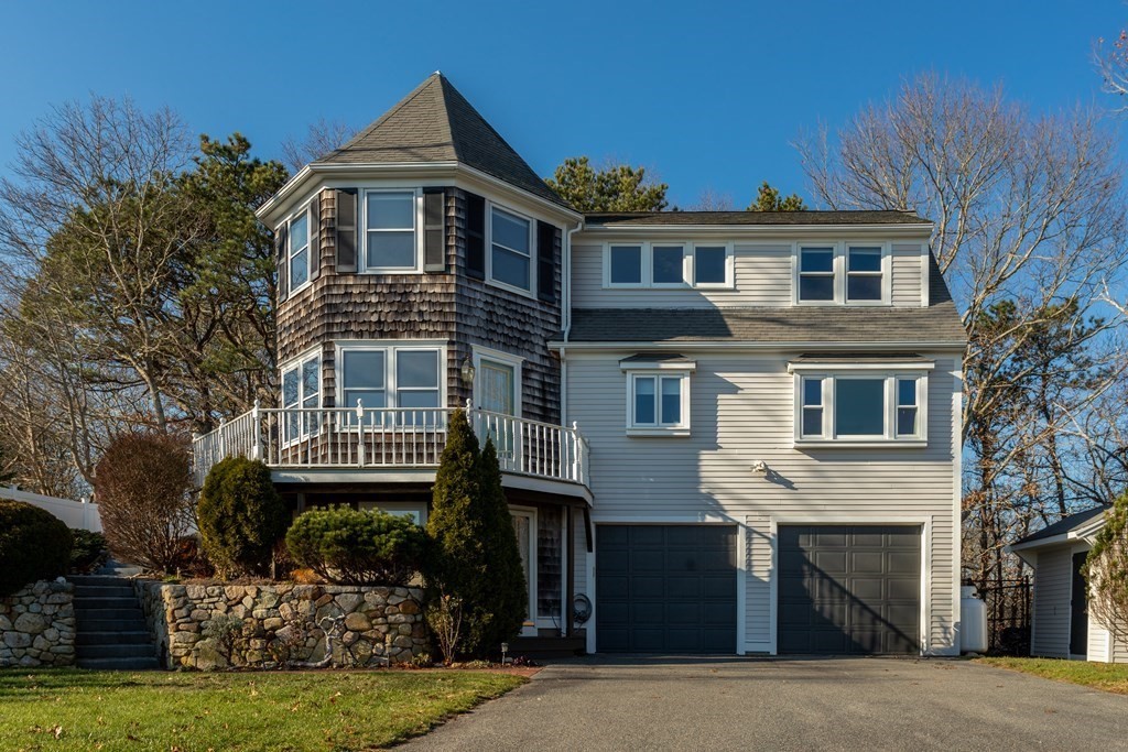 1 Lily Pond Road Plymouth, MA 02360 - Photo 5 of 40 a front view of a house with a garden