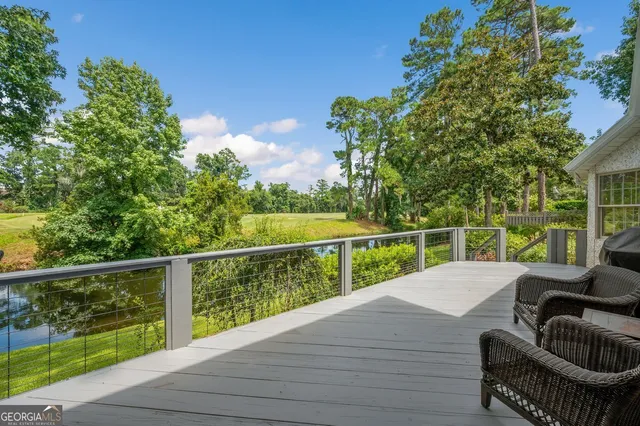 a view of balcony with furniture