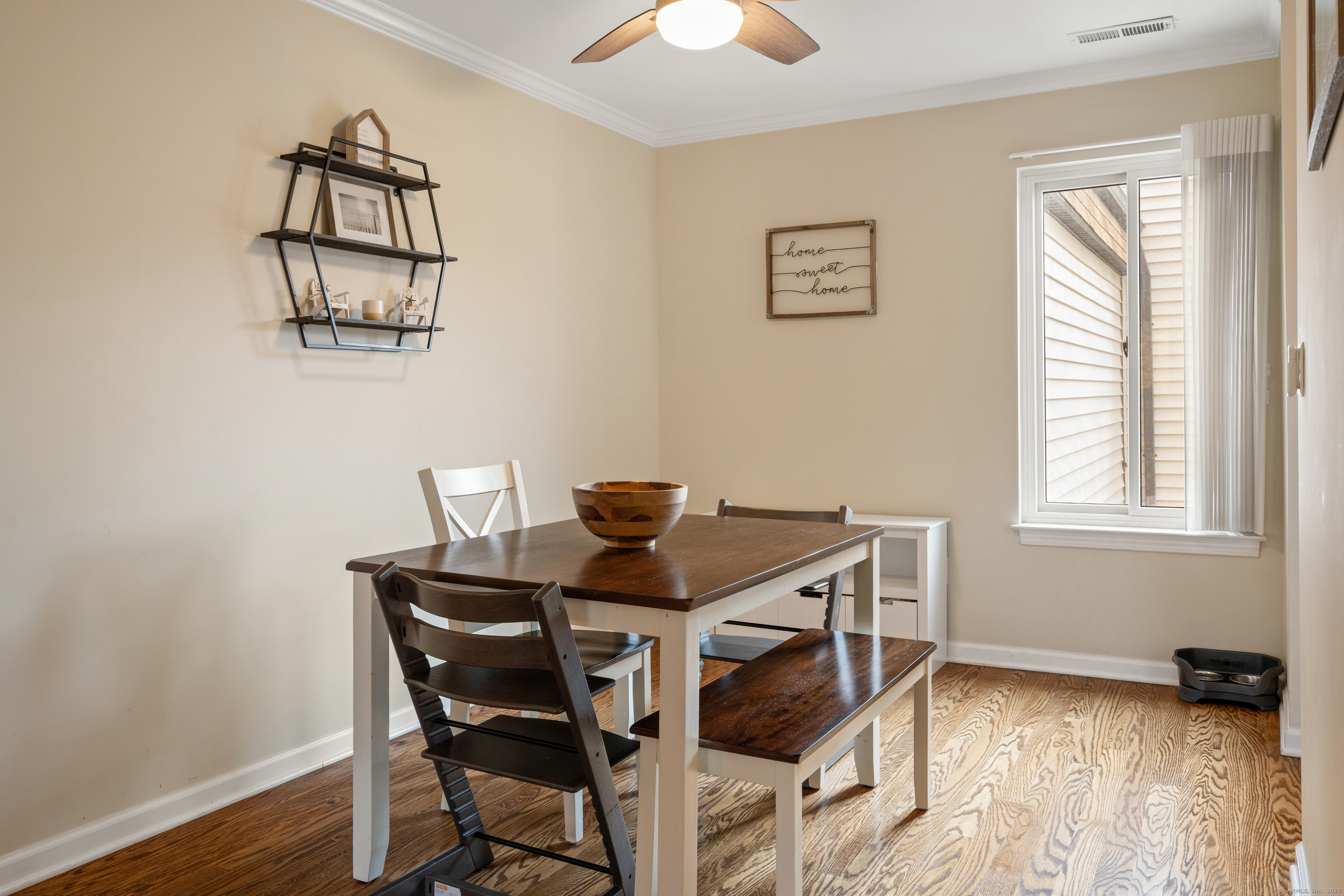 37 Riverside Avenue, Unit D Stamford, CT 06905 - Photo 11 of 29 a view of a workspace room with furniture and wooden floor