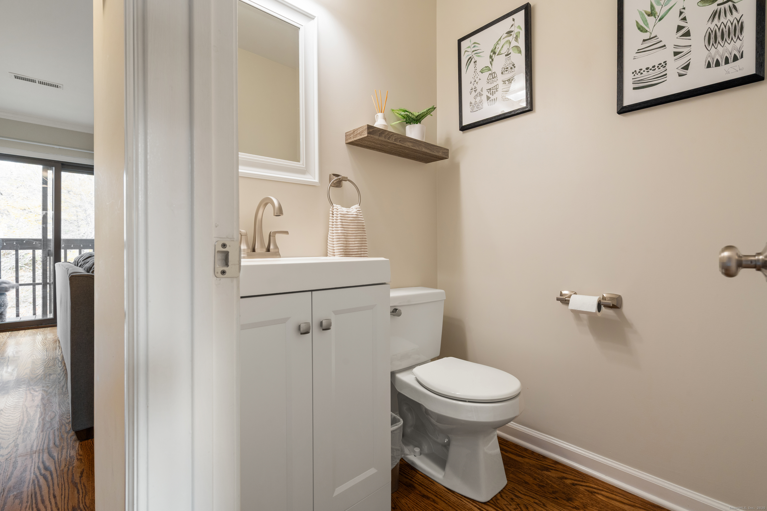 37 Riverside Avenue, Unit D Stamford, CT 06905 - Photo 16 of 29 a bathroom with a toilet and a sink