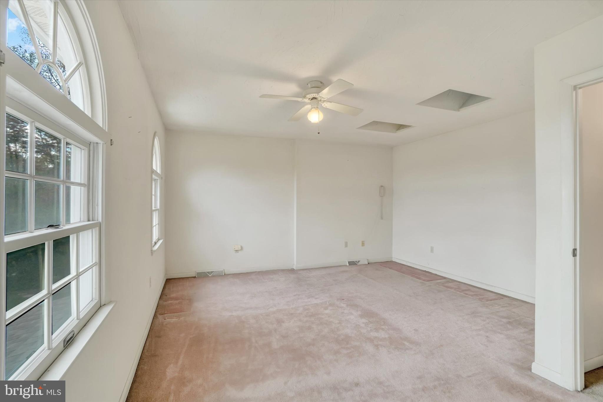 34 Jean Lo Way York, PA 17406 - Photo 13 of 27 an empty room with windows and fan