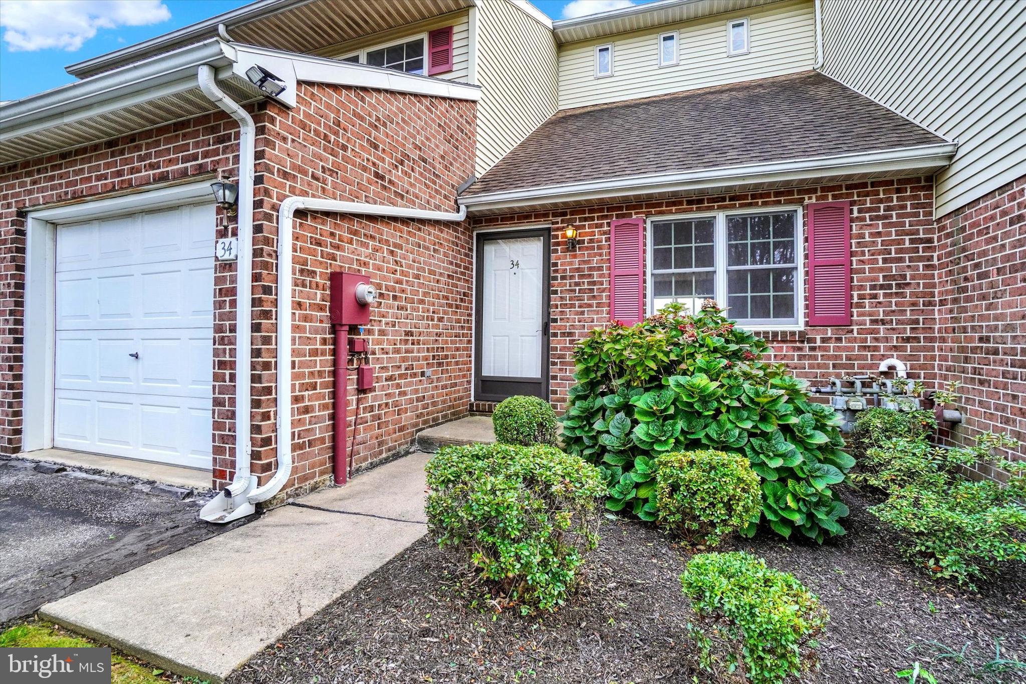 34 Jean Lo Way York, PA 17406 - Photo 2 of 27 a view of a house with potted plants