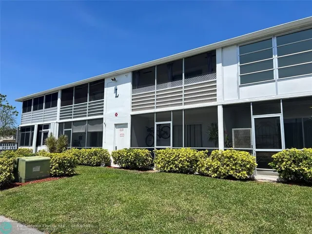 a view of a house with a garden
