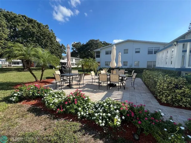 a garden view with sitting space