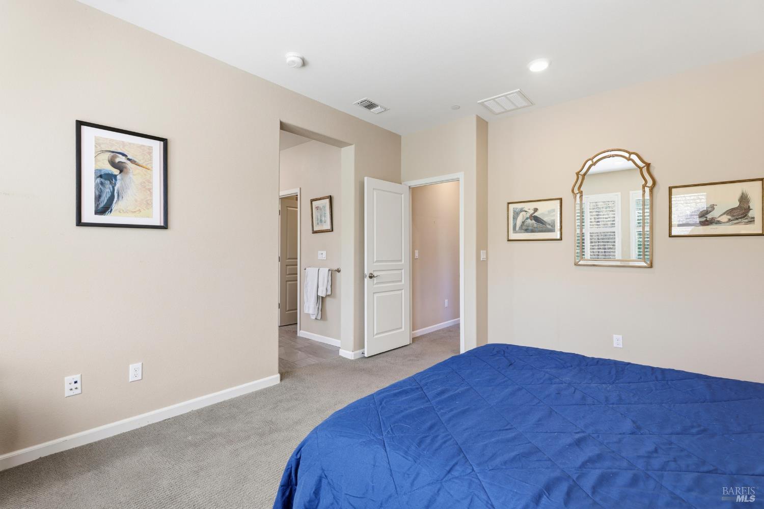 5533 Kennedy Place Rohnert Park, CA 94928 - Photo 23 of 63 a bedroom with a bed and a painting