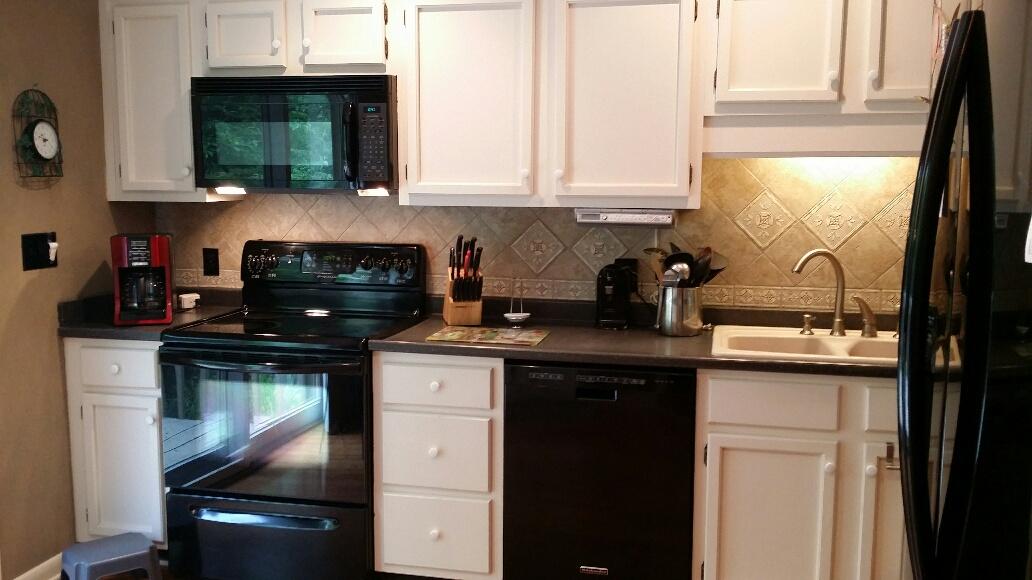 43 Willow Circle Blue Ridge, VA 24064 - Photo 6 of 43 a kitchen with stainless steel appliances granite countertop a sink stove and cabinets