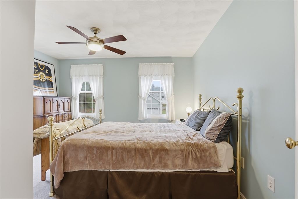 233 Bartholomew Street Peabody, MA 01960 - Photo 22 of 37 a bedroom with a bed and window