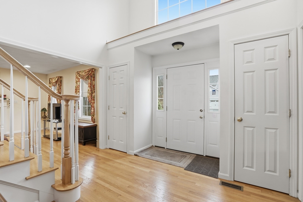 233 Bartholomew Street Peabody, MA 01960 - Photo 3 of 37 a view of empty room with wooden floor