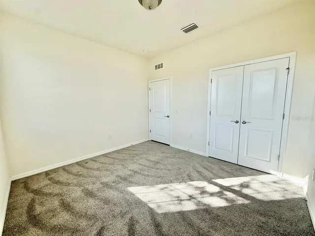 a view of a closet in a room
