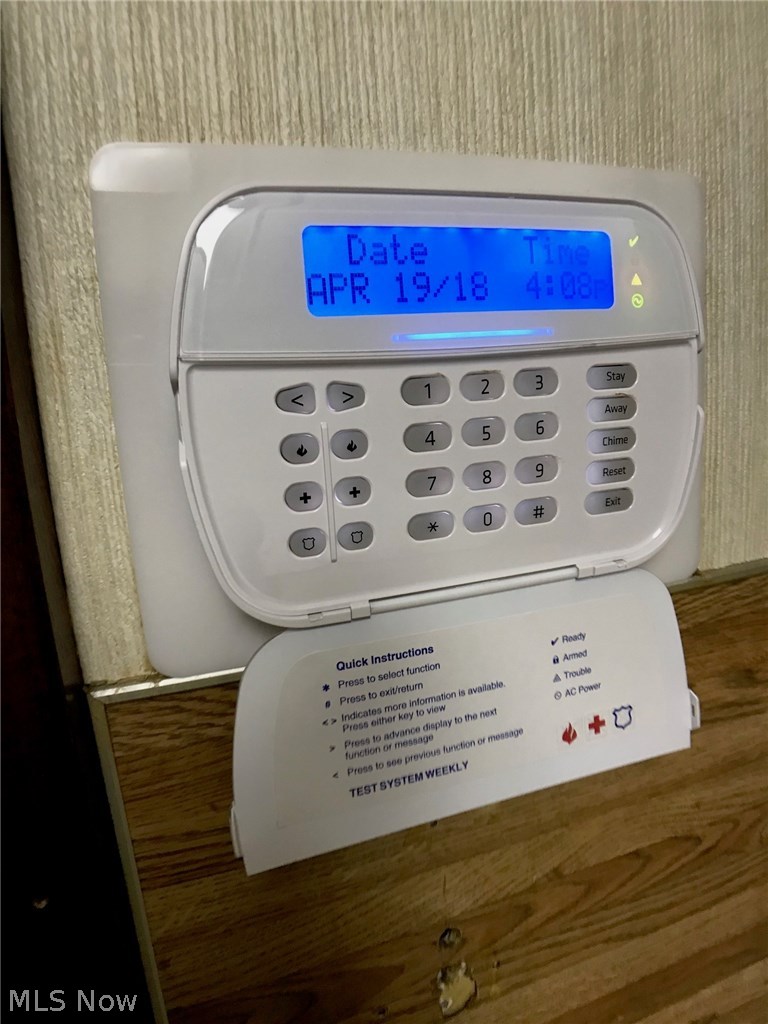 297 North Road Northeast Warren, OH 44483 - Photo 34 of 35 View of keypad for security system.