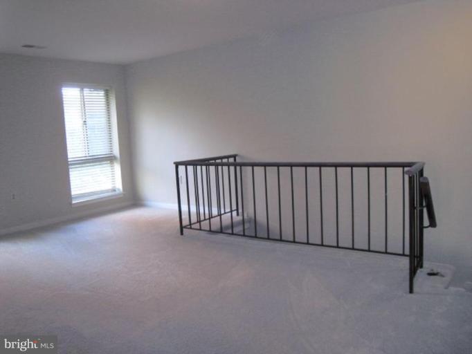 35 Andrew Place, Unit R112 Baltimore, MD 21201 - Photo 13 of 20 a view of a room with a window