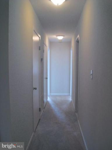 35 Andrew Place, Unit R112 Baltimore, MD 21201 - Photo 15 of 20 a view of hallway with shower