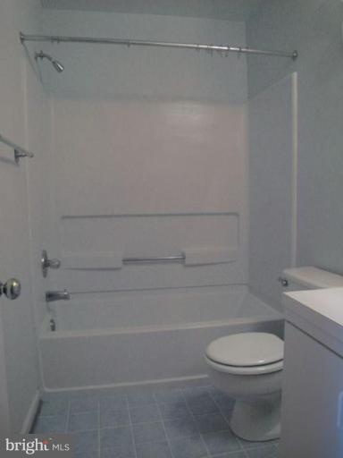 35 Andrew Place, Unit R112 Baltimore, MD 21201 - Photo 8 of 20 a bathroom with a toilet and a shower