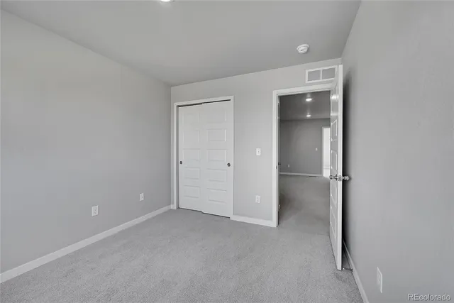 an empty room with an entryway