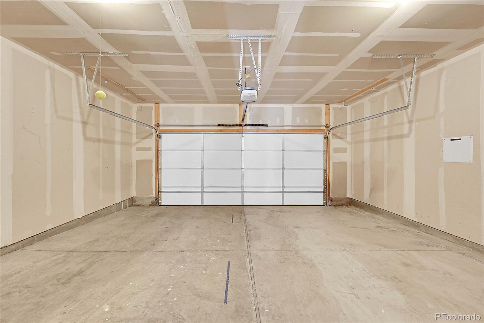 1353 Reynolds Street, Unit 3C Fort Lupton, CO 80621 - Photo 30 of 31 a view of a garage