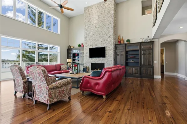 a bedroom with furniture and a window