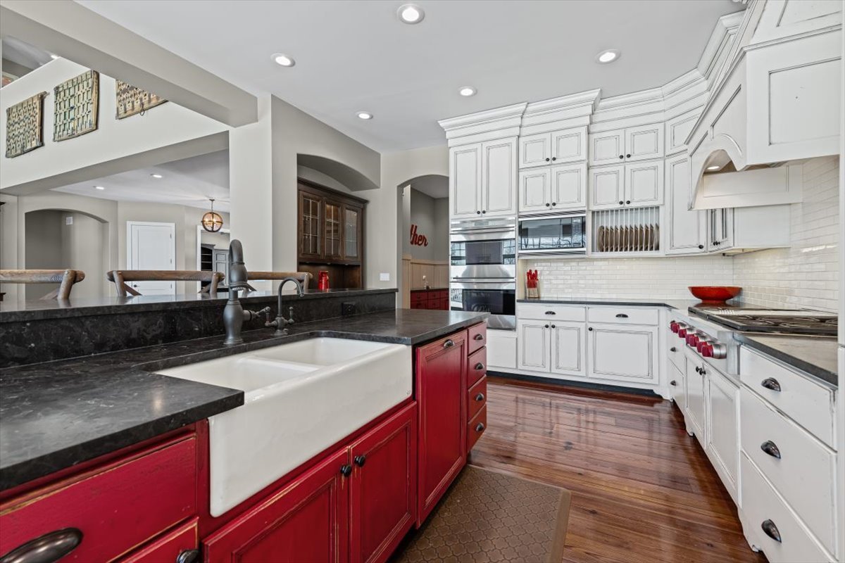 38778 North Ackerman Road Antioch, IL 60002 - Photo 22 of 97 a large kitchen with stainless steel appliances granite countertop a stove a sink dishwasher and a refrigerator