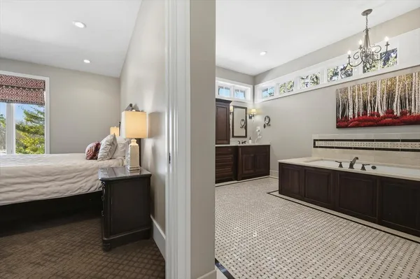 a bathroom with a sink and a washer dryer