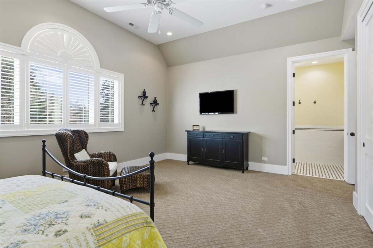 38778 North Ackerman Road Antioch, IL 60002 - Photo 35 of 82 a living room with furniture and a flat screen tv