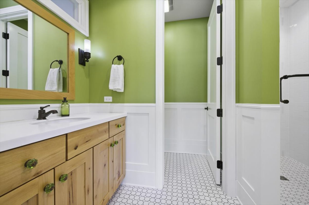 38778 North Ackerman Road Antioch, IL 60002 - Photo 43 of 82 a bathroom with a sink and a mirror
