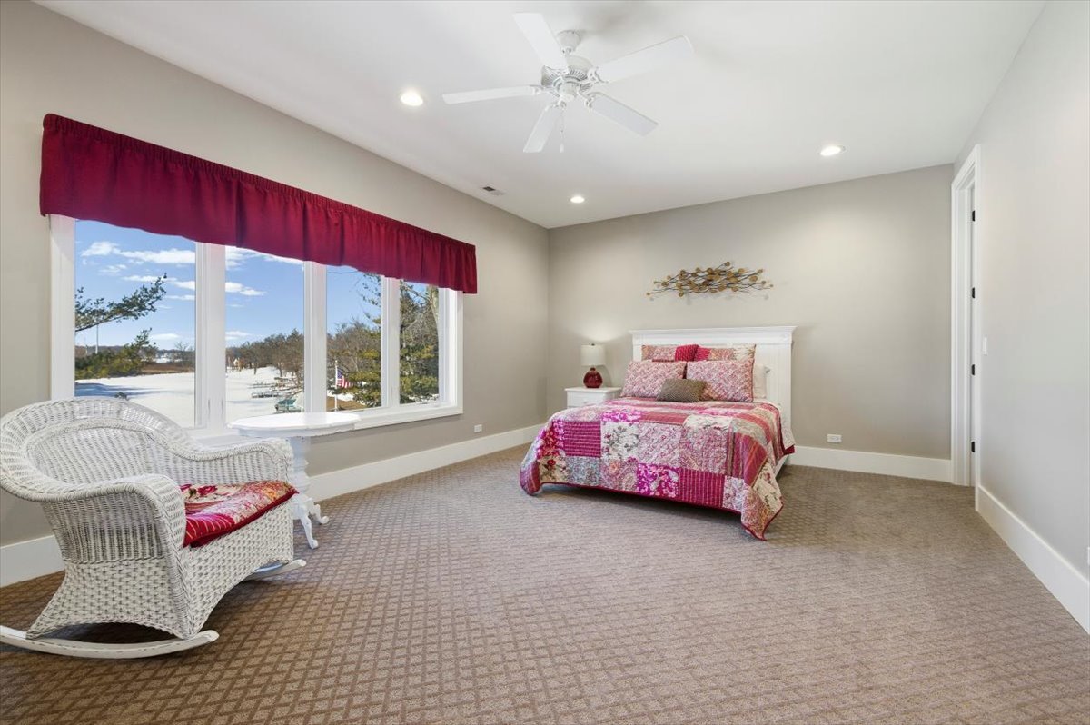 38778 North Ackerman Road Antioch, IL 60002 - Photo 45 of 97 a bedroom with a bed and wooden floor