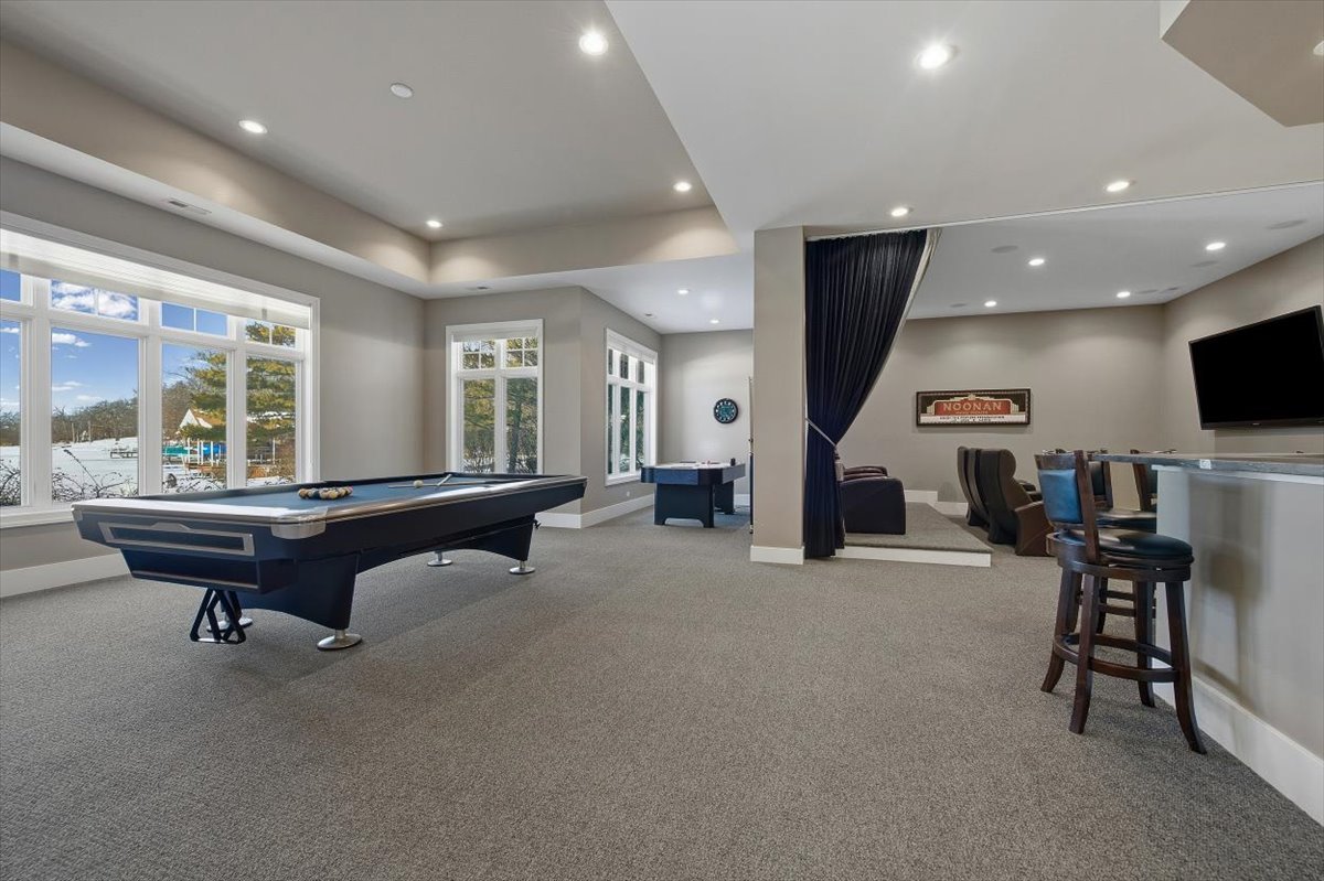 38778 North Ackerman Road Antioch, IL 60002 - Photo 52 of 82 a room with gym equipment and a large window