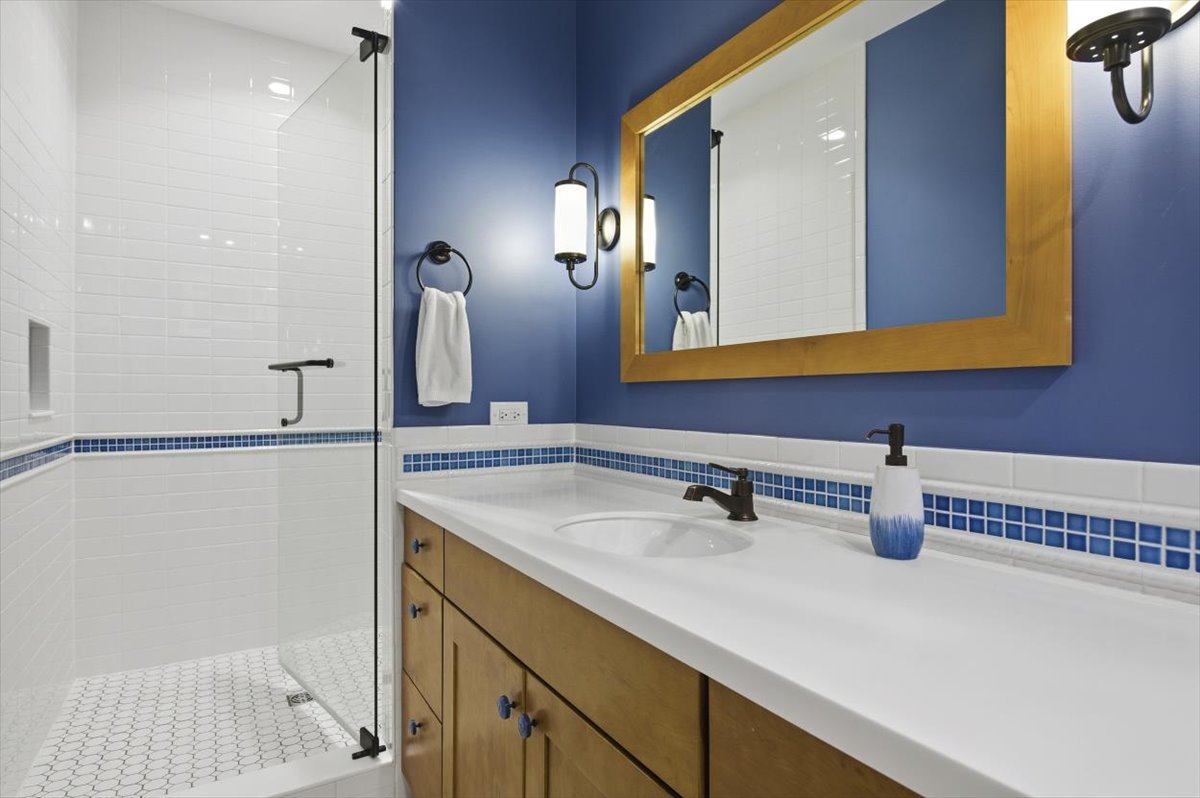 38778 North Ackerman Road Antioch, IL 60002 - Photo 54 of 97 a bathroom with a sink and a mirror