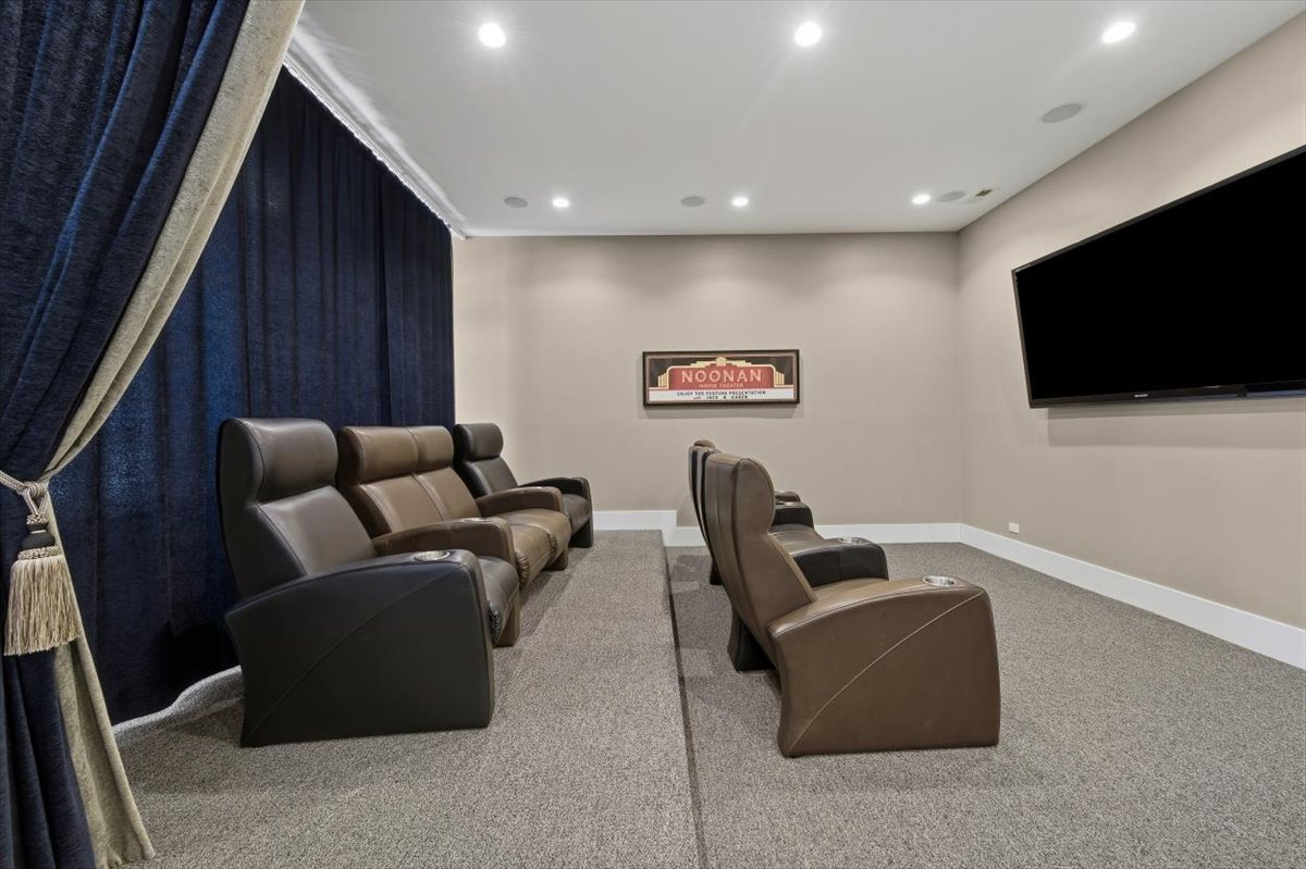 38778 North Ackerman Road Antioch, IL 60002 - Photo 56 of 82 a living room with furniture and a flat screen tv