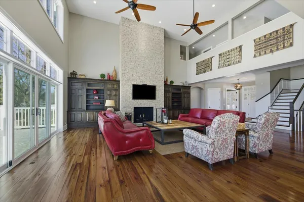 a kitchen with stainless steel appliances granite countertop wooden cabinets and a stove top oven