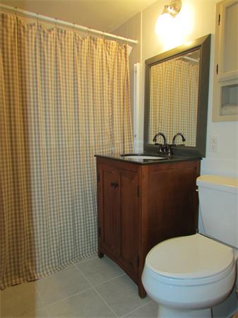 68 Argilla Road Ipswich, MA 01938 - Photo 13 of 25 a bathroom with a toilet and a sink
