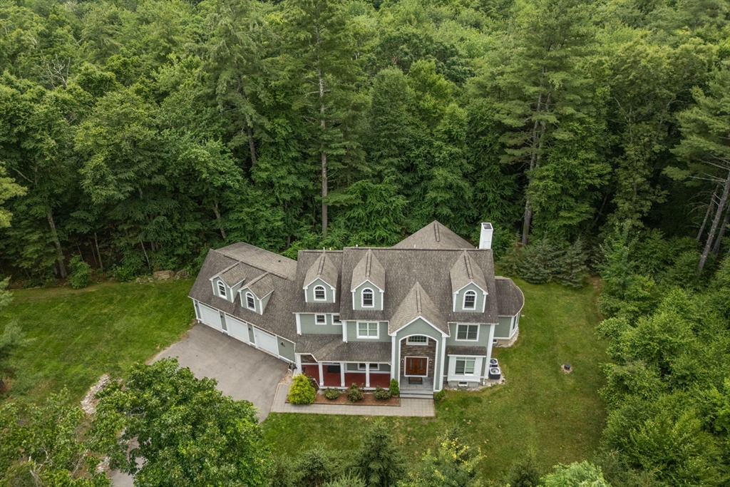 24 Wayside Inn Road Framingham, MA 01701 - Photo 1 of 38 an aerial view of a house with a yard