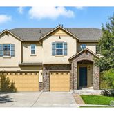 a front view of a house with yard