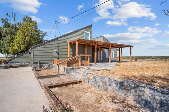 a view of a house with a patio