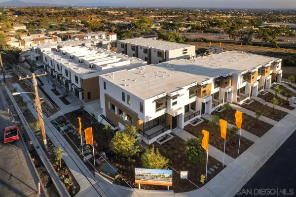 an aerial view of a multi story parking building