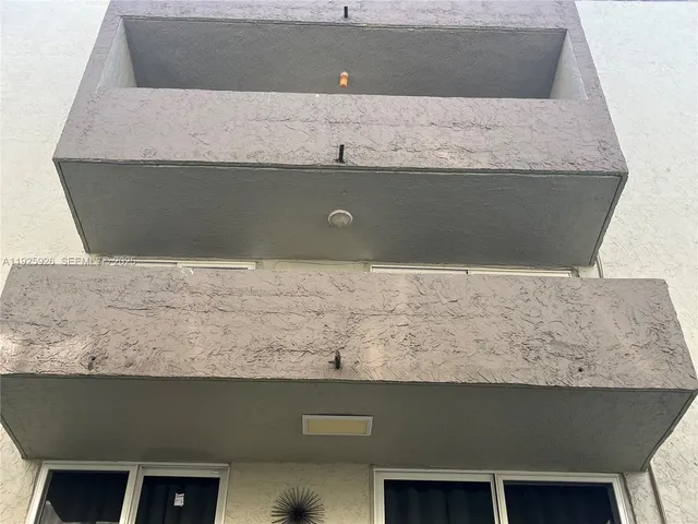 a top view of a house with a yard