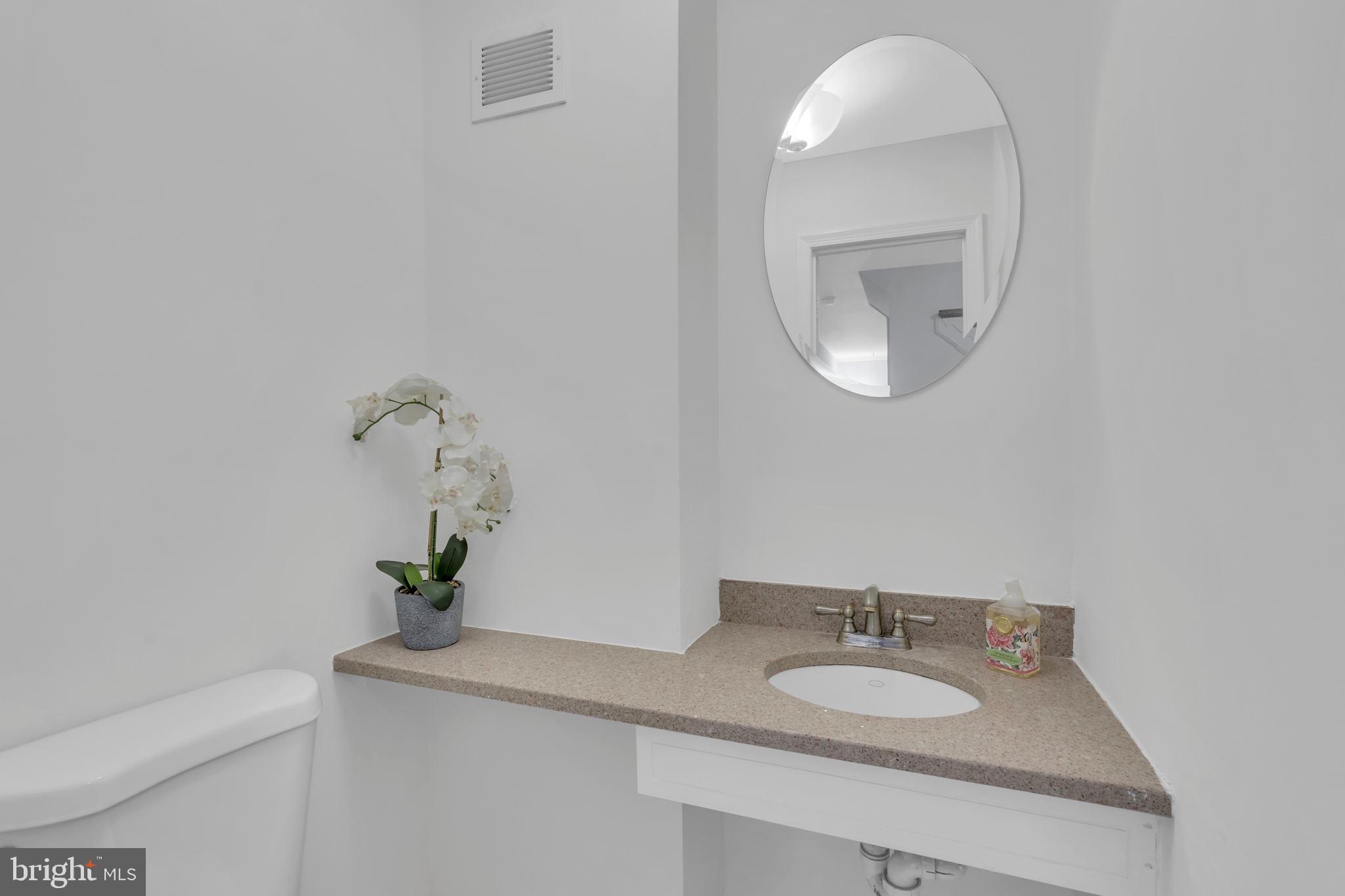 1533 Arbor View Road Silver Spring, MD 20902 - Photo 8 of 37 Convenient powder room on the main level