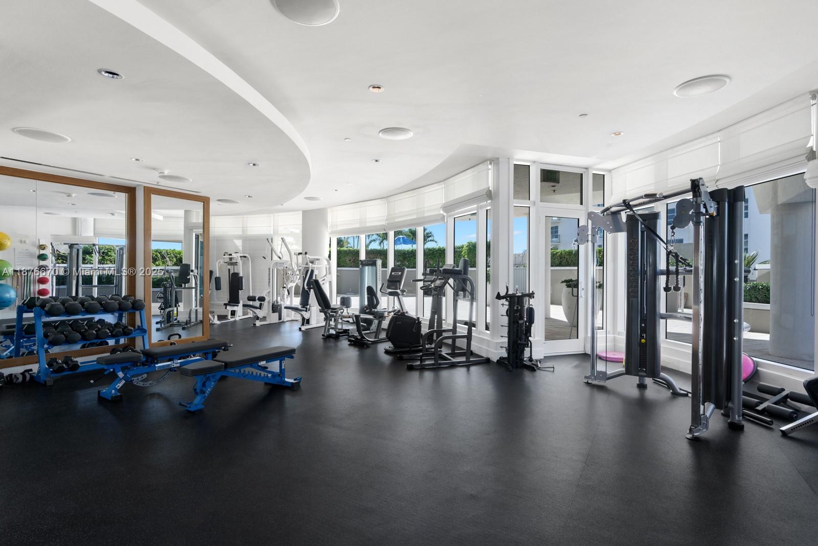 3801 Collins Avenue, Unit 503 Miami Beach, FL 33140 - Photo 29 of 31 a view of a room with gym equipment
